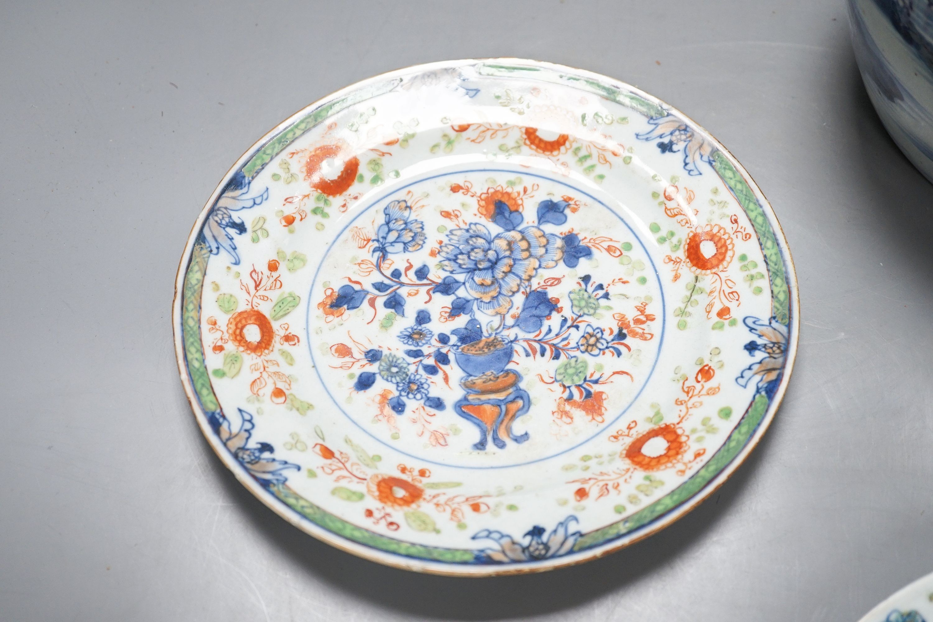 An 18th century Chinese blue and white jar, three 18th century clobbered Chinese plates and a pair of Satsuma vases